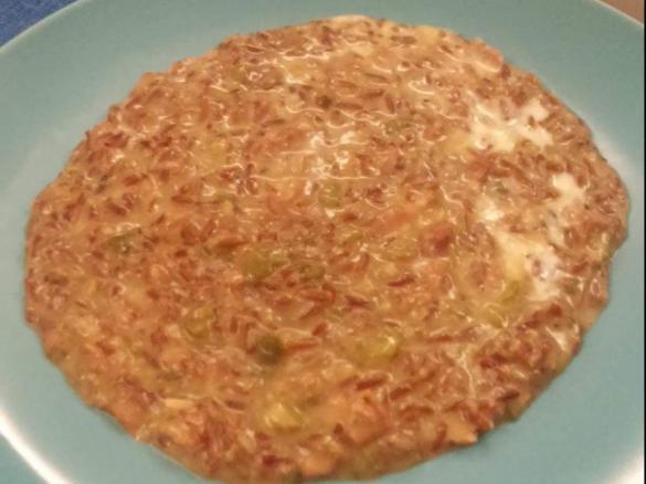 Risotto rosso integrale con speck, zucchine e stracchino