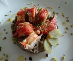 Astice su crema di funghi shiitake con zenzero marinato e granella di pistacchio