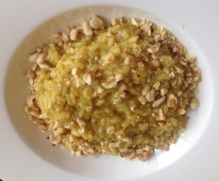 Risotto al curry con nocciole e cipolla di Tropea