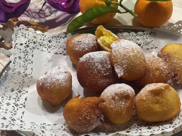 Arrobiolus frittelle di ricotta, zafferano e scorze