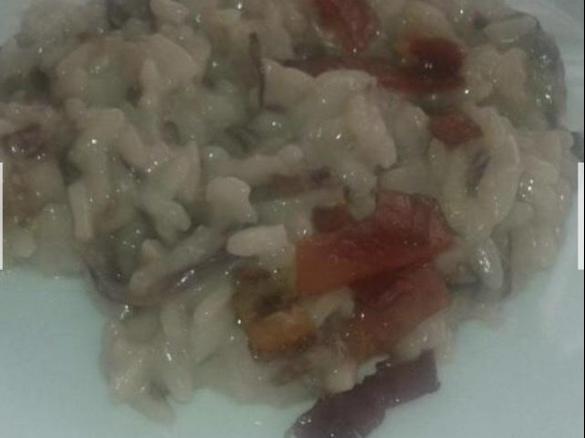 Variante di risotto radicchio taleggio e speck croccante