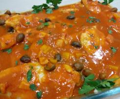 Filetti di pangasio con peperoni e olive taggiasche