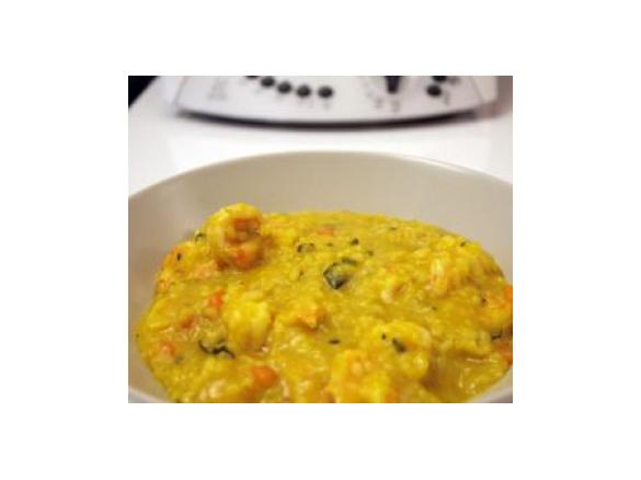 Paella con gamberi e verdure