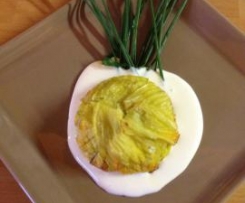 Sformatini di fiori di zucca, su letto di fonduta