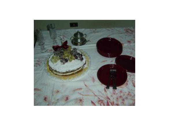 "Torta ricotta e pere con uva brinata"