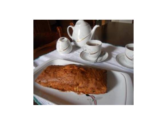 Plum-cake profumato all'arancia con uvetta e scorzette candite