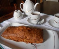 Plum-cake profumato all'arancia con uvetta e scorzette candite