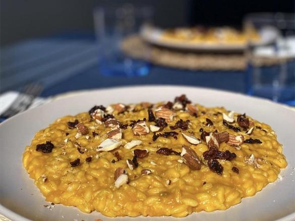 Risotto con zucca delica, mandorle tostate e bacon croccante