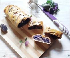 Strudel salato pasta matta ripieno di patate viola  speck e mozzarella  a  fette