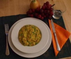 Risotto con salsiccia, piselli e zafferano