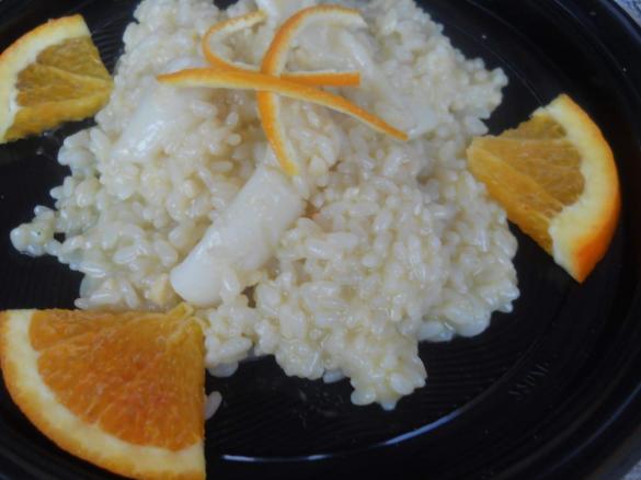 Risotto con Arancia Calamari e granella di Mandorle 