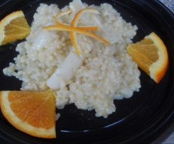 Risotto con Arancia Calamari e granella di Mandorle 