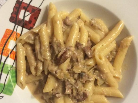 Pennette carciofi noci e pancetta e panna 