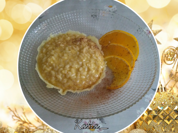 Risotto cremoso al profumo di arancia e cannella su cestino di Montasio - Natale