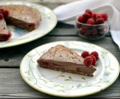 Cheesecake con mousse al cioccolato e zenzero con lamponi
