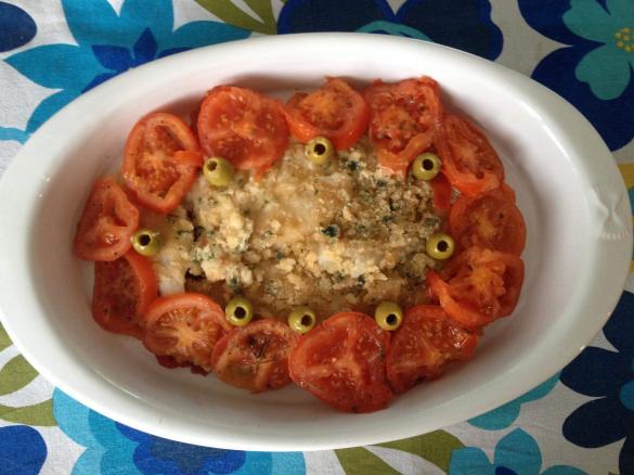 FILETTO DI NASELLO SU LETTO DI POMODORI