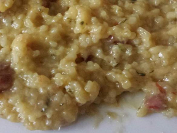 risotto allo zafferano con pancetta zucchine e  pomodori secchi