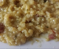 risotto allo zafferano con pancetta zucchine e  pomodori secchi