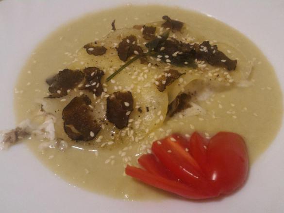 Filetti di orata al tartufo nero e crema di carciofi