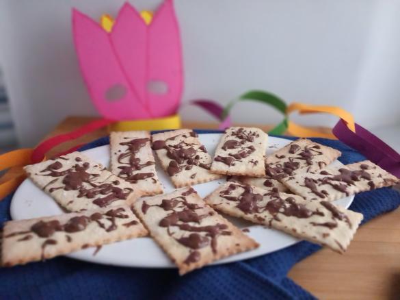 Frappe (o Chiacchiere) con cioccolato fuso cotte al forno