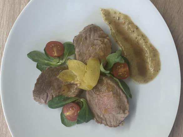 Filetto di maiale con pesche caramellate