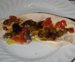 PESCE SPADA CON POMODORI, CAPPERI,OLIVE.