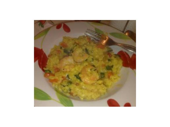 Paella con gamberi e verdure