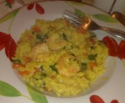Paella con gamberi e verdure
