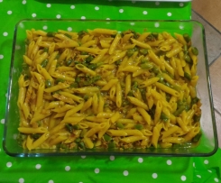 Mezze penne risottate con la curcuma, asparagi e speck