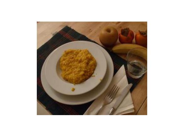 Risotto prosciutto, montasio e zafferano