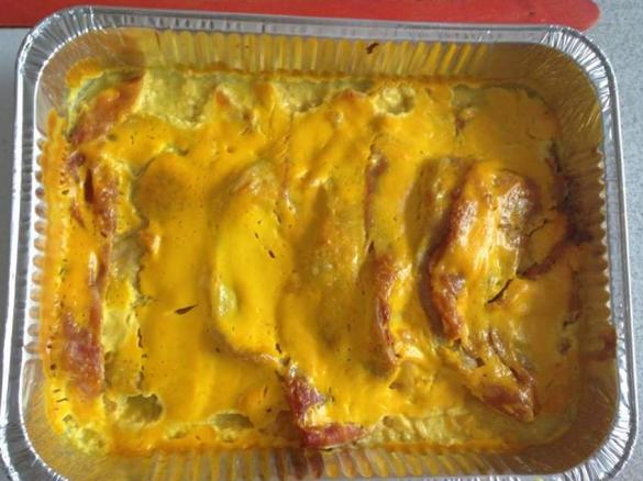 Lonza di Maiale con prosciutto e salsa allo zafferano