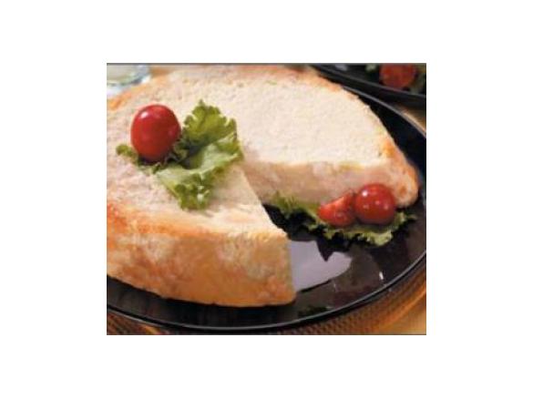 Sformato di pane con porri e crema al Parmigiano filante 