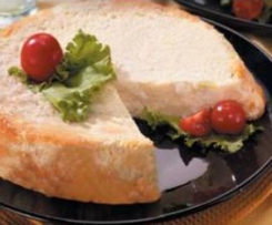 Sformato di pane con porri e crema al Parmigiano filante 