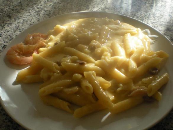 Penne risottate con speck e gamberetti