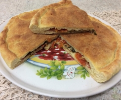 Focaccia ripiena Speck,Rucola e Pomodorini