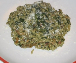 Risotto con pancetta, porcini e spinaci.