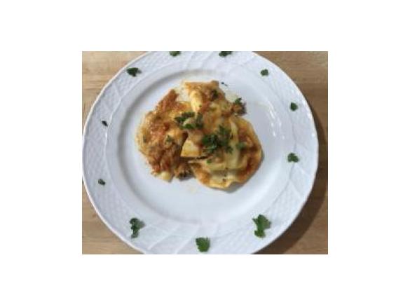 Ravioli di orata con sugo ai calamaretti