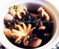 Polipetti in bianco con olive, limone e capperi