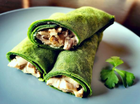 Crespelle di spinaci farcite con funghi