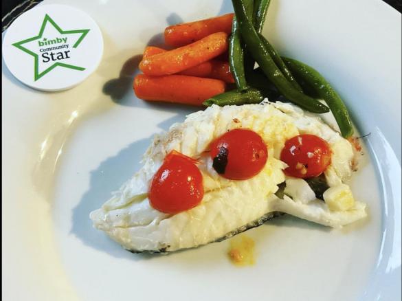 Scorfano in sottovuoto con pomodorini