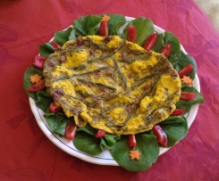 Omelette di uovo d'oca con fiori edibili e punte di asparagina