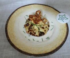 Fagottino di crepes con fave novelle con fonduta di caprino