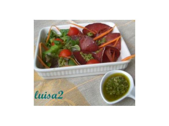 Condimento con olive verdi e rucola