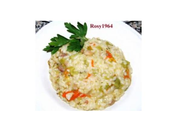 Risotto con salsiccia, zucchina e fiori di zucca