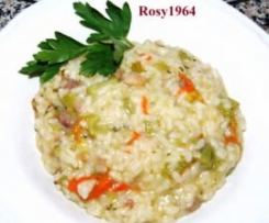 Risotto con salsiccia, zucchina e fiori di zucca