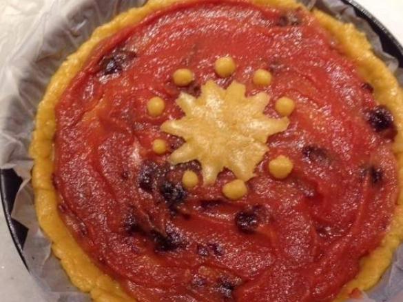 Crostata aromatizzata all arancia e marmellata variegata